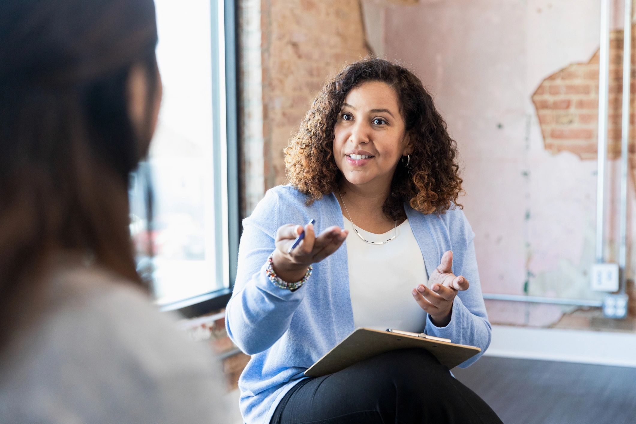 Therapist meeting one-on-one with a client
