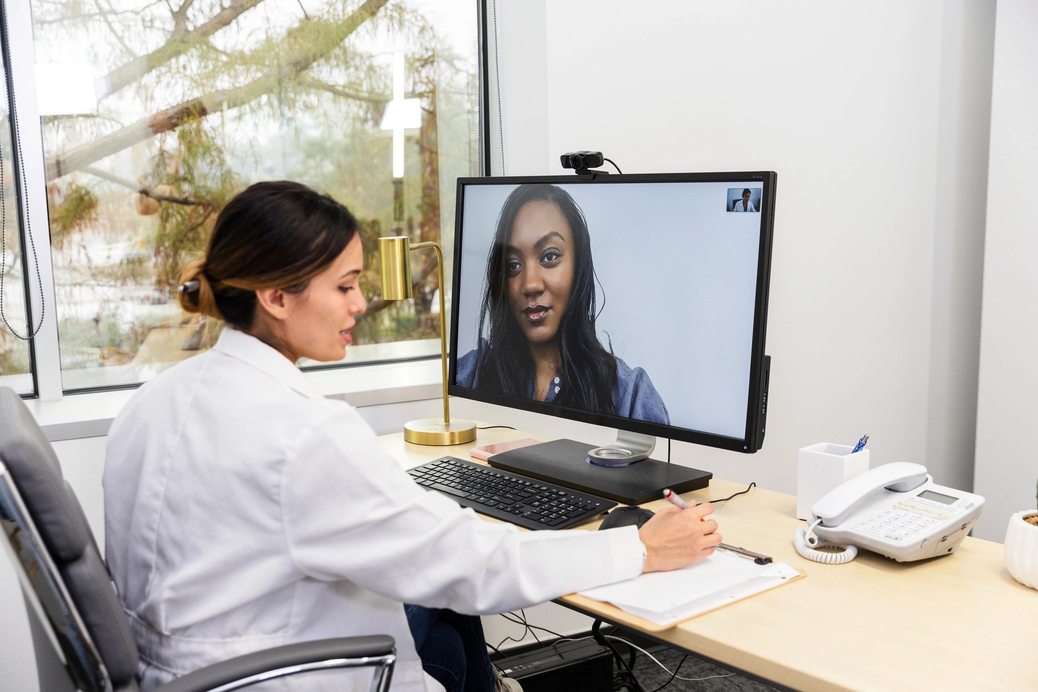 Client attending a virtual appointment with a clinician